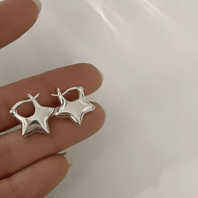 Astrielle - Star-shaped zirconia earrings with cross detail